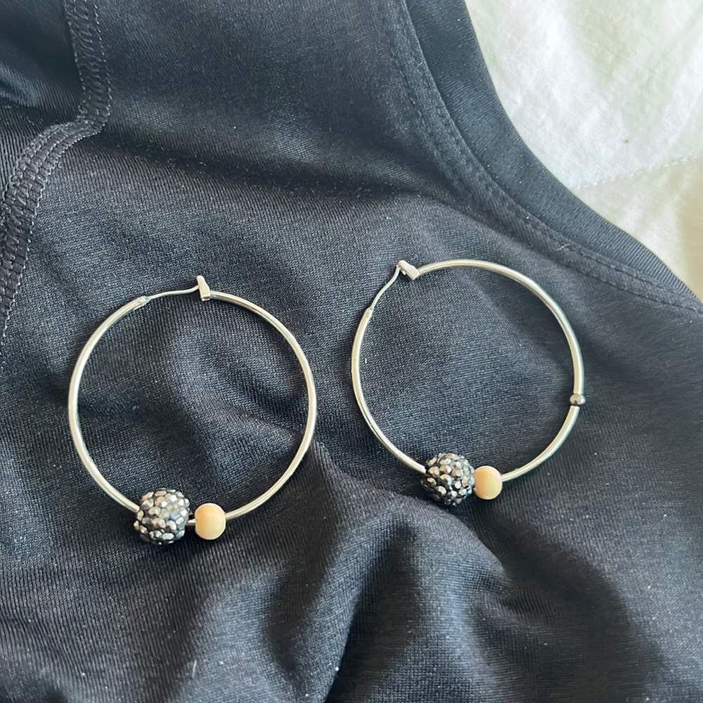 Large silver hoops with black sparkle bead embellishment